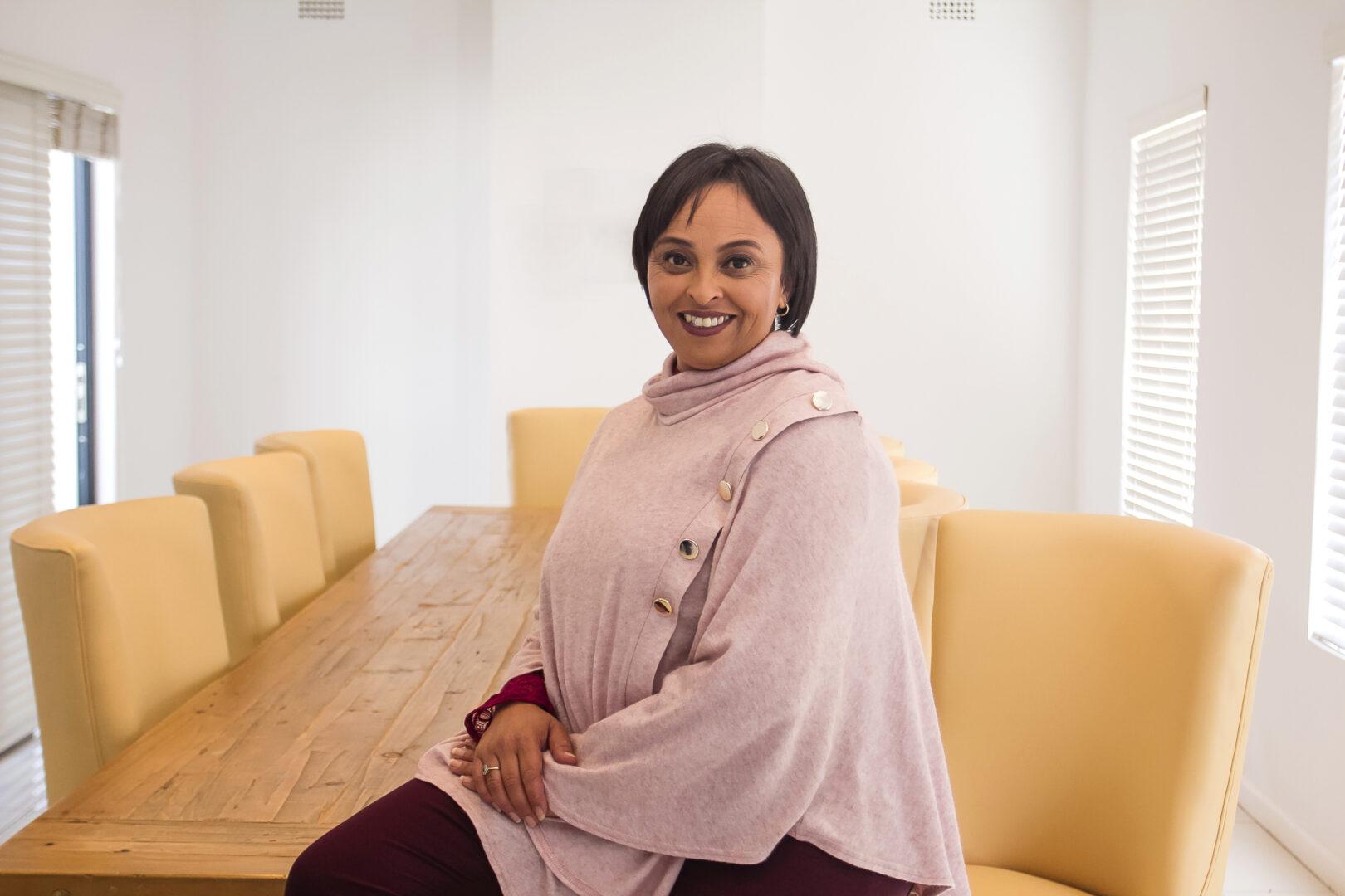 Newsletter article image header of lelanie abrahms sitting on a desk for an interview